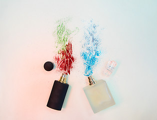 Image showing Flat lay composition with two perfume bottles