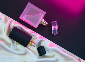 Image showing Flat lay composition with two perfume bottles