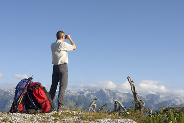 Image showing Hiker on mountain summit