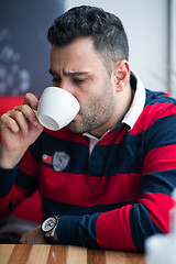 Image showing business man drinking coffe