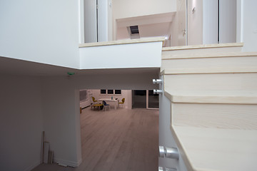 Image showing stylish interior with wooden stairs