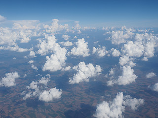 Image showing blue sky with clouds background seen from flying plane