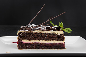 Image showing Plate with piece of delicious chocolate cake