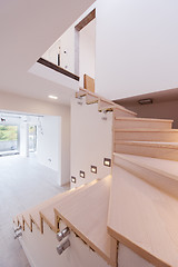 Image showing stylish interior with wooden stairs