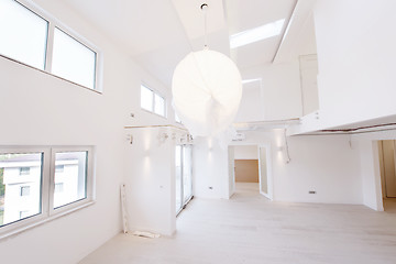 Image showing Interior of empty stylish modern open space two level apartment