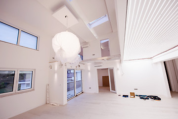 Image showing Interior of empty stylish modern open space two level apartment