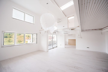 Image showing Interior of empty stylish modern open space two level apartment