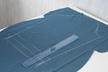 Image showing Designer Cutting Fabric