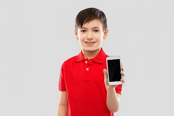 Image showing smiling boy showing blank screen of smartphone