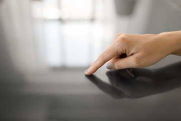 Image showing hand using black interactive panel