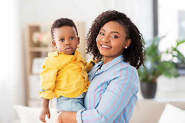 Image showing happy african american mother with baby at home