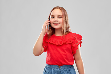 Image showing beautiful smiling girl calling on smartphone