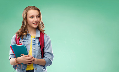 Image showing happy smiling teenage student girl with school bag