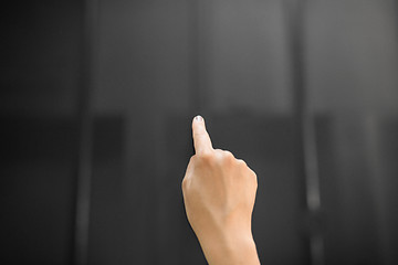 Image showing hand using black interactive panel