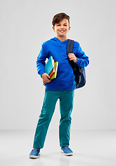 Image showing smiling student boy with books and school bag