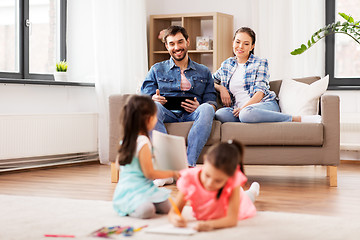 Image showing happy family spending free time at home