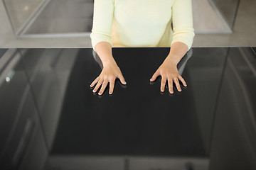 Image showing close up of woman using black interactive panel