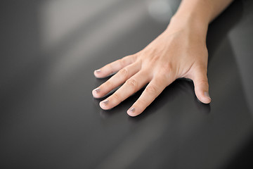 Image showing hand using black interactive panel