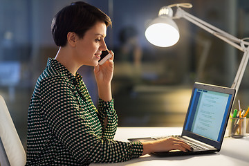 Image showing businesswoman calling on smartphone at office