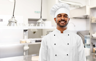 Image showing happy male indian chef at restaurant kitchen