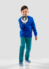 Image showing smiling boy speaking to megaphone