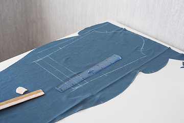 Image showing Designer Cutting Fabric