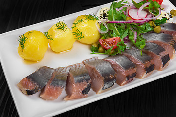 Image showing Sliced salted herring