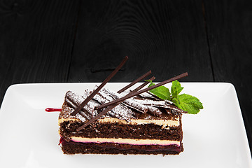 Image showing Plate with piece of delicious chocolate cake