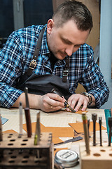 Image showing Concept of handmade craft production of leather goods.