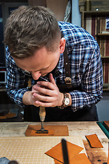 Image showing Concept of handmade craft production of leather goods.