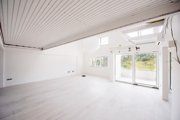 Image showing Interior of empty stylish modern open space two level apartment