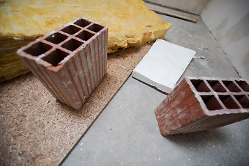 Image showing red Bricks and glass wool