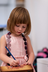 Image showing little girl painting jewelry box