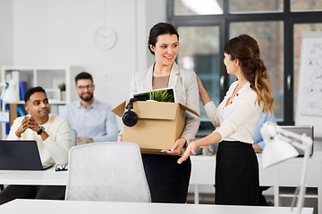 Image showing new female employee meeting colleagues at office