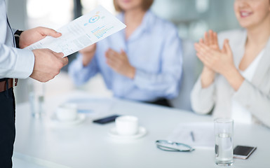 Image showing business team at office meeting or presentation