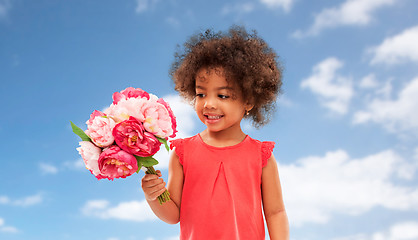 Image showing happy little african american girl with flowers