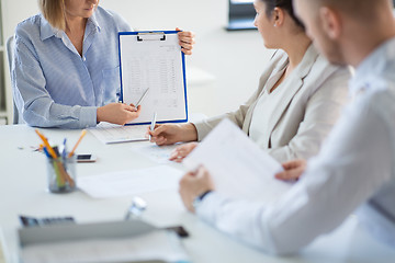 Image showing business team discussing report at office