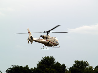 Image showing Helicopter hovering