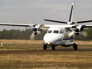 Image showing Commuter plane on taxiway