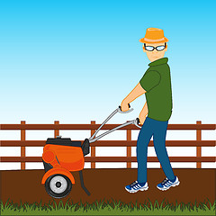 Image showing Man with walking tractor works at area