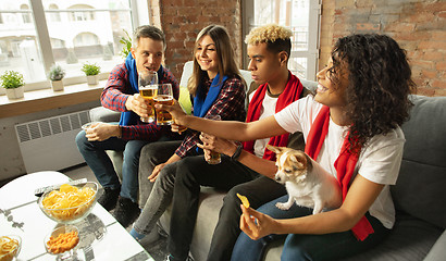 Image showing Excited group of people watching sport match, championship at home