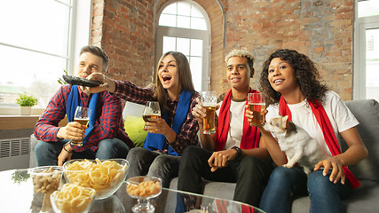 Image showing Excited group of people watching sport match, championship at home