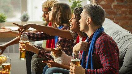 Image showing Excited group of people watching sport match, championship at home