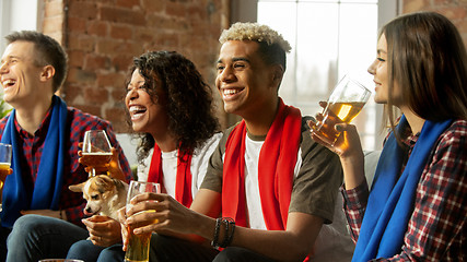 Image showing Excited group of people watching sport match, championship at home