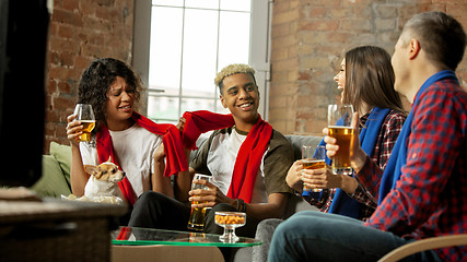 Image showing Excited group of people watching sport match, championship at home