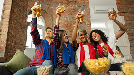 Image showing Excited group of people watching sport match, championship at home