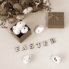 Image showing Festive Easter card with a bouquet of roses and a red box