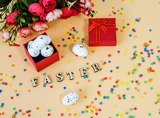 Image showing Festive Easter card with a bouquet of roses and a red box