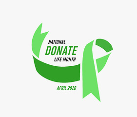 Image showing National donate life month. Vector illustration with green ribbon on light