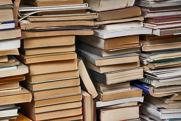 Image showing Wall of books piled up